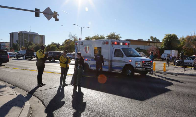 LAS VEGAS, NEVADA - DECEMBER 06: An ambulance leaves on Maryland Parkway on the east side of the UNLV campus after a shooting on December 06, 2023 in Las Vegas, Nevada. According to Las Vegas Metro Police, a suspect is dead and multiple victims are reported after a shooting on the campus. (Photo by Ethan Miller/Getty Images)